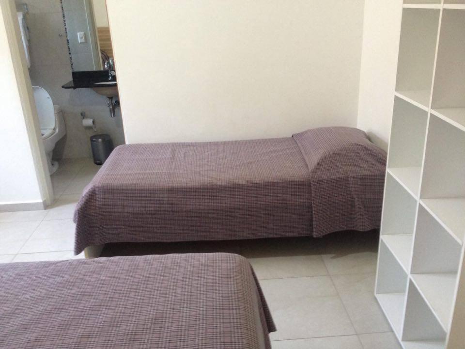 Pousada Parque Suites Estacionamento E Piscina Guaruja Bilik gambar