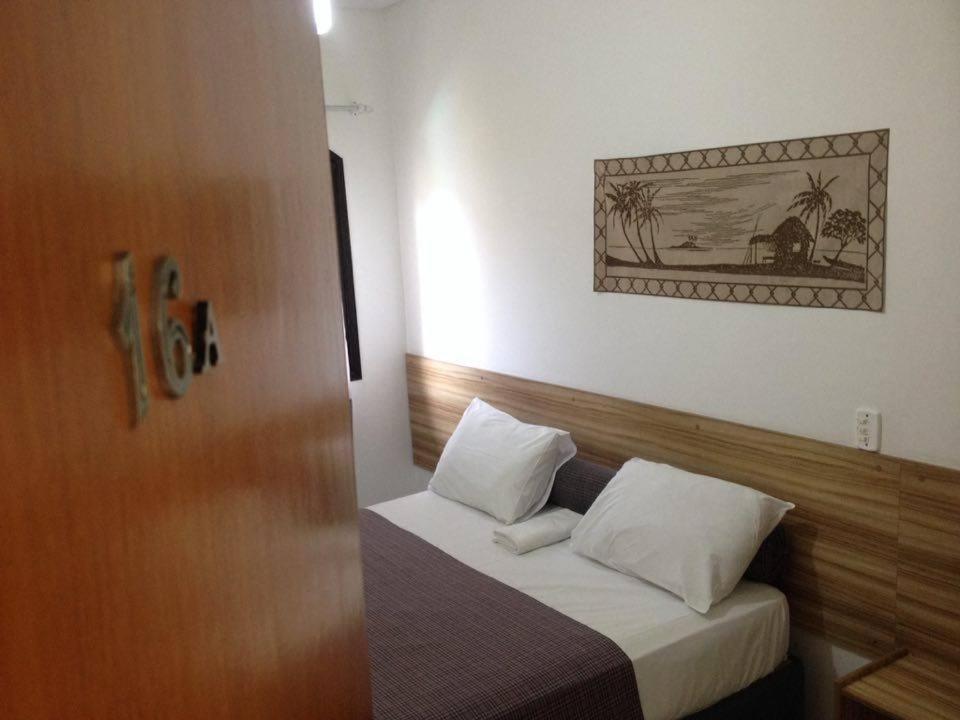 Pousada Parque Suites Estacionamento E Piscina Guaruja Bilik gambar